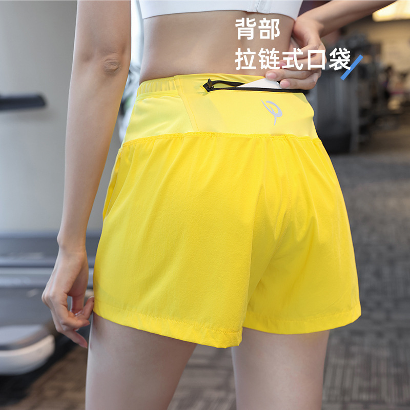 Fábrica de fuerza de tenis femenino forrado falso dos piezas de bádminton yoga deportivo rápido secado acondicionamiento físico pantalones de mujer