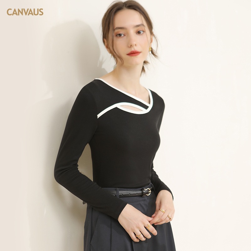 Canvaus mujeres de otoño e invierno de alta gama de diseño de manga larga irregular cuello redondo exterior desgaste hueco-camisa de fondo