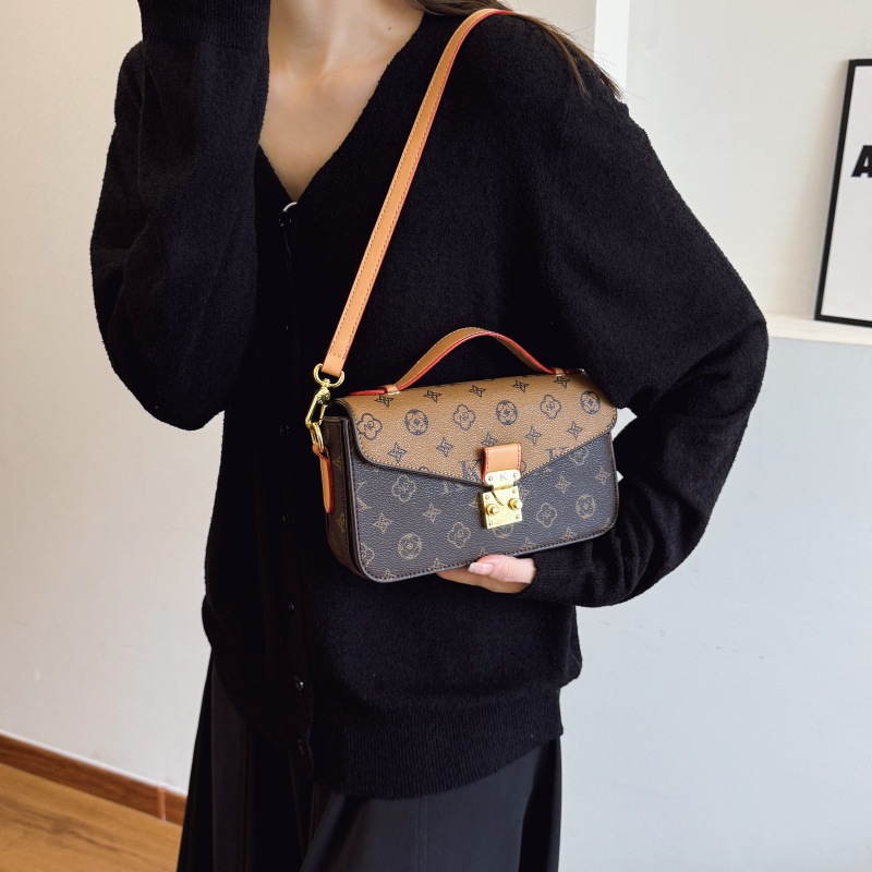 Bolso de textura transfronteriza 2025 verano nuevo bolso femenino retro impreso bolso de hombro moda contraste color bandolera marea