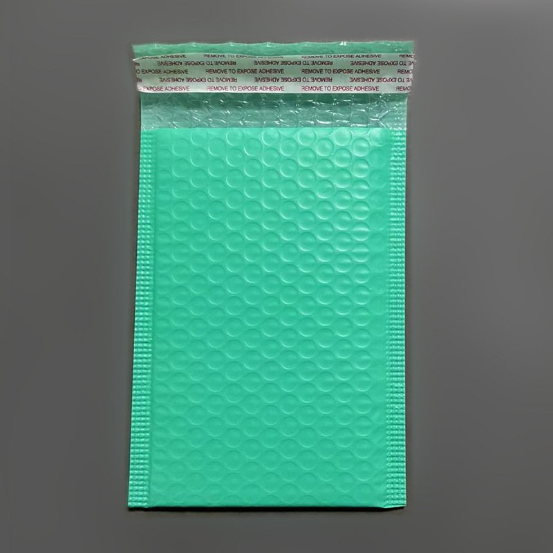 Empaquetado de ropa de burbujas negras autoadherentes Empaquetado de película de coextrusión de color al por mayor Bolsa de burbujas express de espuma de película nacarada