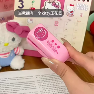 Embosser (Hello Kitty) metal handheld stamping machine, compact pink, embossing roll or set