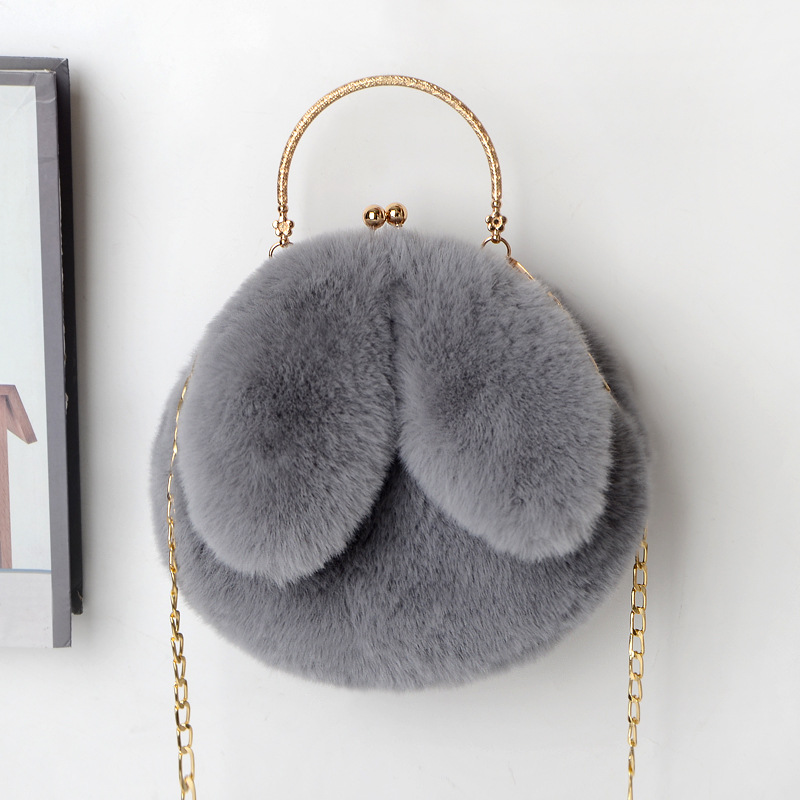 复制_2021新款兔耳朵包手提毛绒链条包包女士.jpg