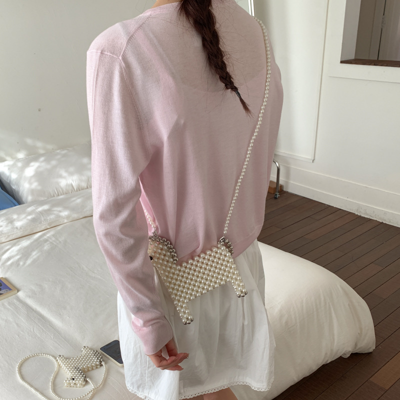 Bonita alpaca para hombres y mujeres bolsas de hombro tejidas a mano mini bolsas de perlas nuevas bolsas de accesorios para niños de comercio exterior
