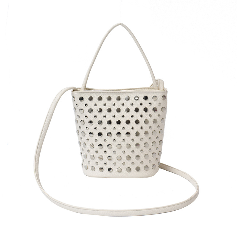 Bolso de cubo de textura transfronteriza 2025 nuevo bolso de mano remache personalizado bolso de hombro retro patrón de lichi bolso de mensajero mujer