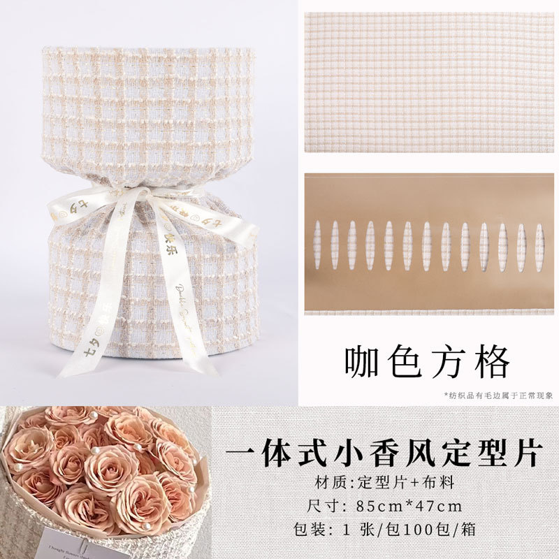 Tela Xiaoxiangfeng al por mayor material de embalaje de flores frescas papel de embalaje de ramo integrado floristería material suministros película de peinado