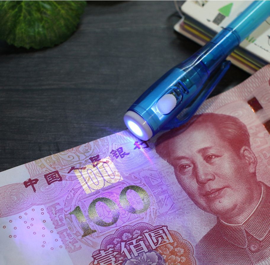 Fábrica directa UV invisible fluorescente pluma LED púrpura Optoelectrónica detector de dinero pluma creativa UV lámpara de tinta mágica pluma