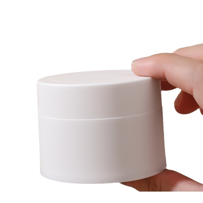 Fábrica al contado 30g / 50g / 80g caja de crema portátil PP material caja de crema exfoliante caja de embalaje cosmético