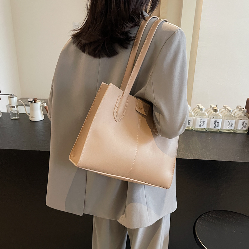 Retro textura de viaje coreano bolsos de mano estudiantes de moda simple bolsos de hombro de gran capacidad bolsos de brazo para mujeres