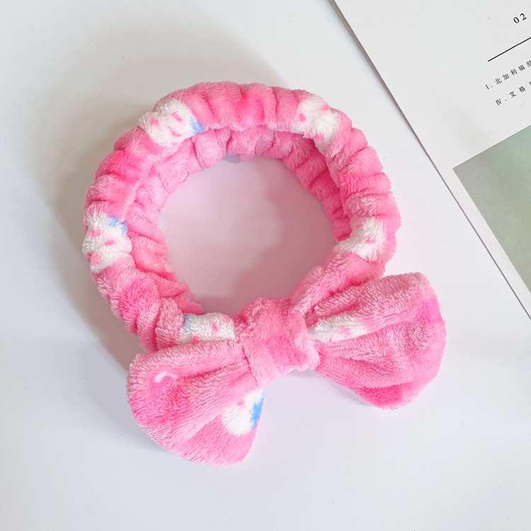 Europa y los Estados Unidos ondulado punto de leopardo coral mariposa fin correa de cabello mujer lavado cara banda de cabello rayas transfronterizas peluche adornamientos para el cabello al por mayor