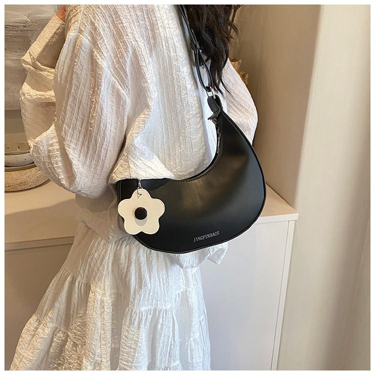 Cross-border women's bag 2024 New style, trendy texture, versatile, ins fashion single-shoulder armpit bag, small flower pendant, crescent moon bag undefined