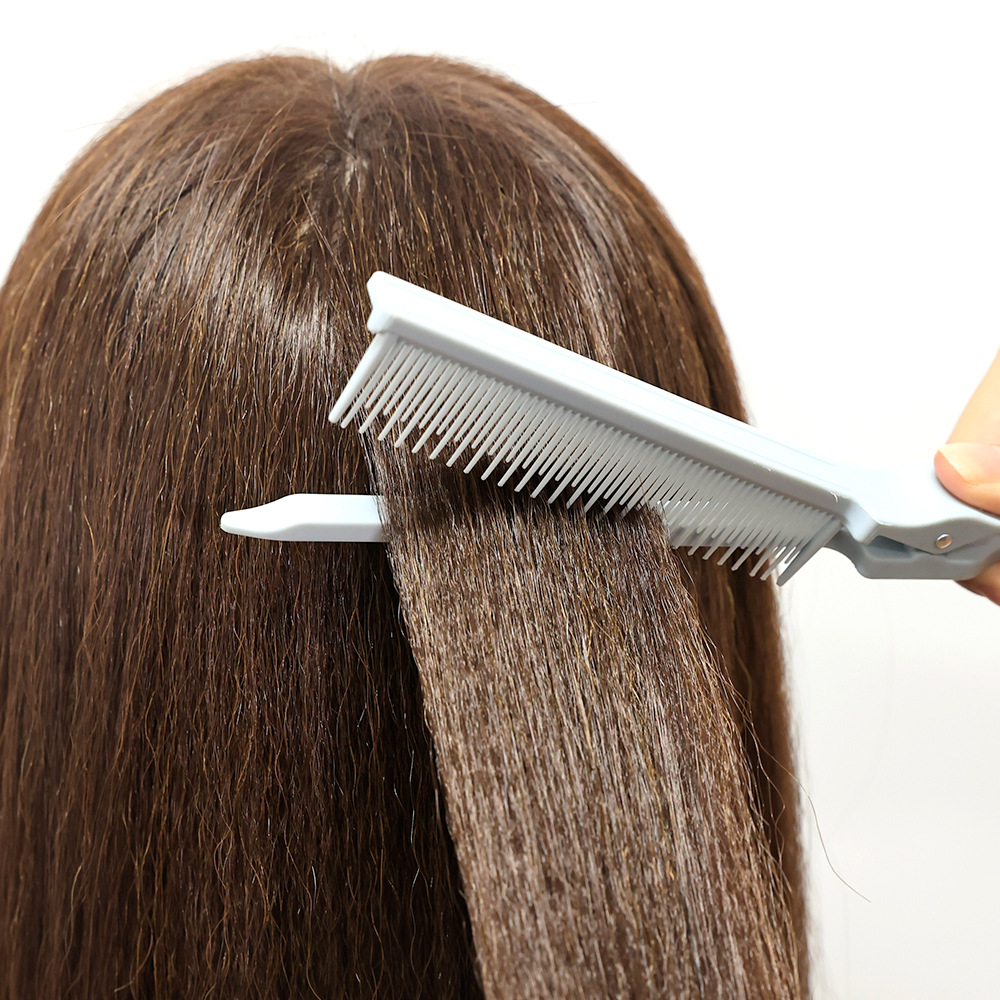 Cross-border Venta caliente multi-función de pinza de pelo teñido peine de peluquería de corte de pelo de la partición de corte de pelo de plástico punta de cola peine
