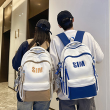 跨境直供大容量背包初中生韩版时尚撞色书包男大学生轻便双肩包