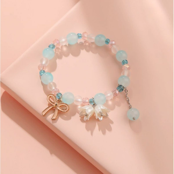 Blue bracelet with bow, orchid