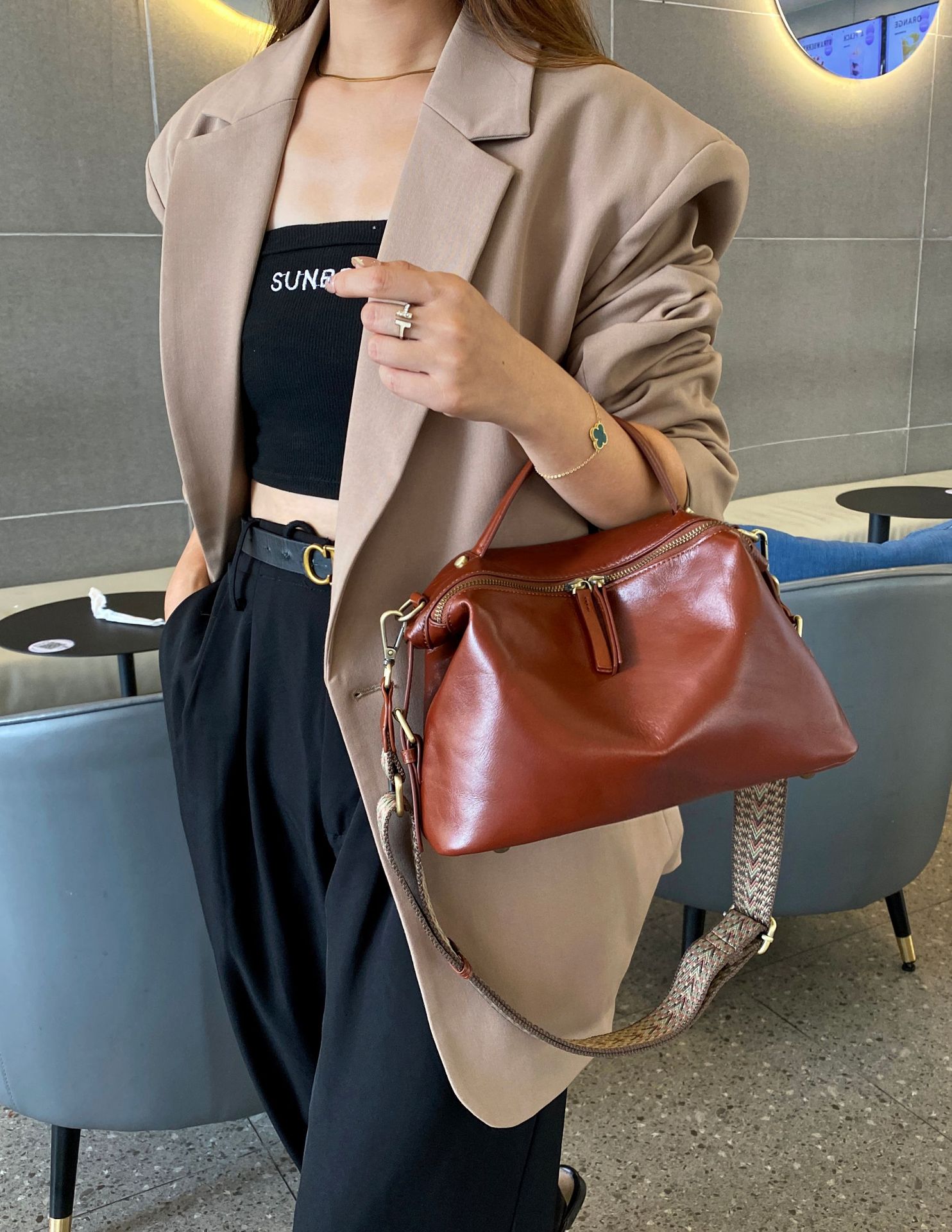 Plant tanned top layer cowhide, niche and versatile single shoulder crossbody minimalist women's zippered dumpling bag,_voghion.com