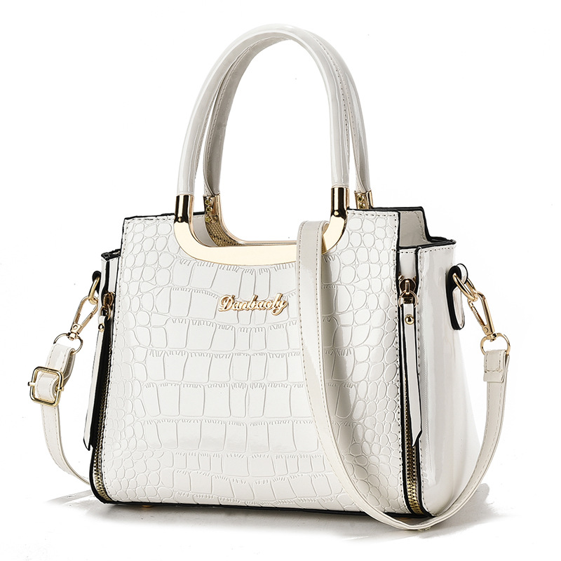 2026 nueva moda esmaltada cocodrilo estampado bolso transfronterizo mujer universal viaje de gran capacidad mochila de hombro
