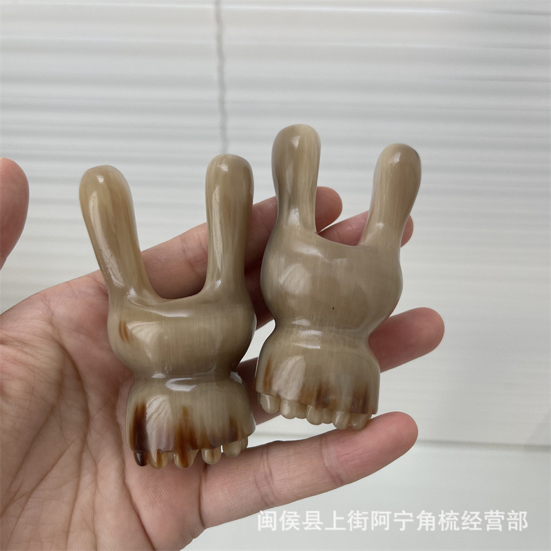 Horn Facial Massage Tool Rabbit Ear Shape Guasha Scraper Portable Buffalo Horn Beauty Roller in use