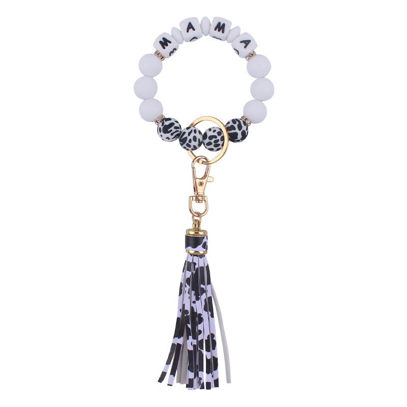 Nuevo cuero pu borla colgante creativo DIY nombre silicona con cuentas leopardo contraste color colgante pulsera llavero
