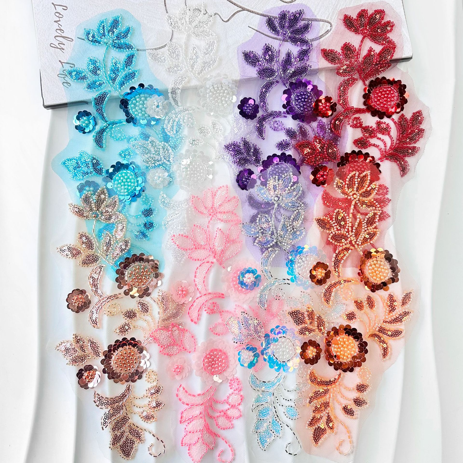 Sequinilla cuentas bordadas decal spot ropa al por mayor vestido de malla multicolor encaje vestido de rendimiento flores encaje