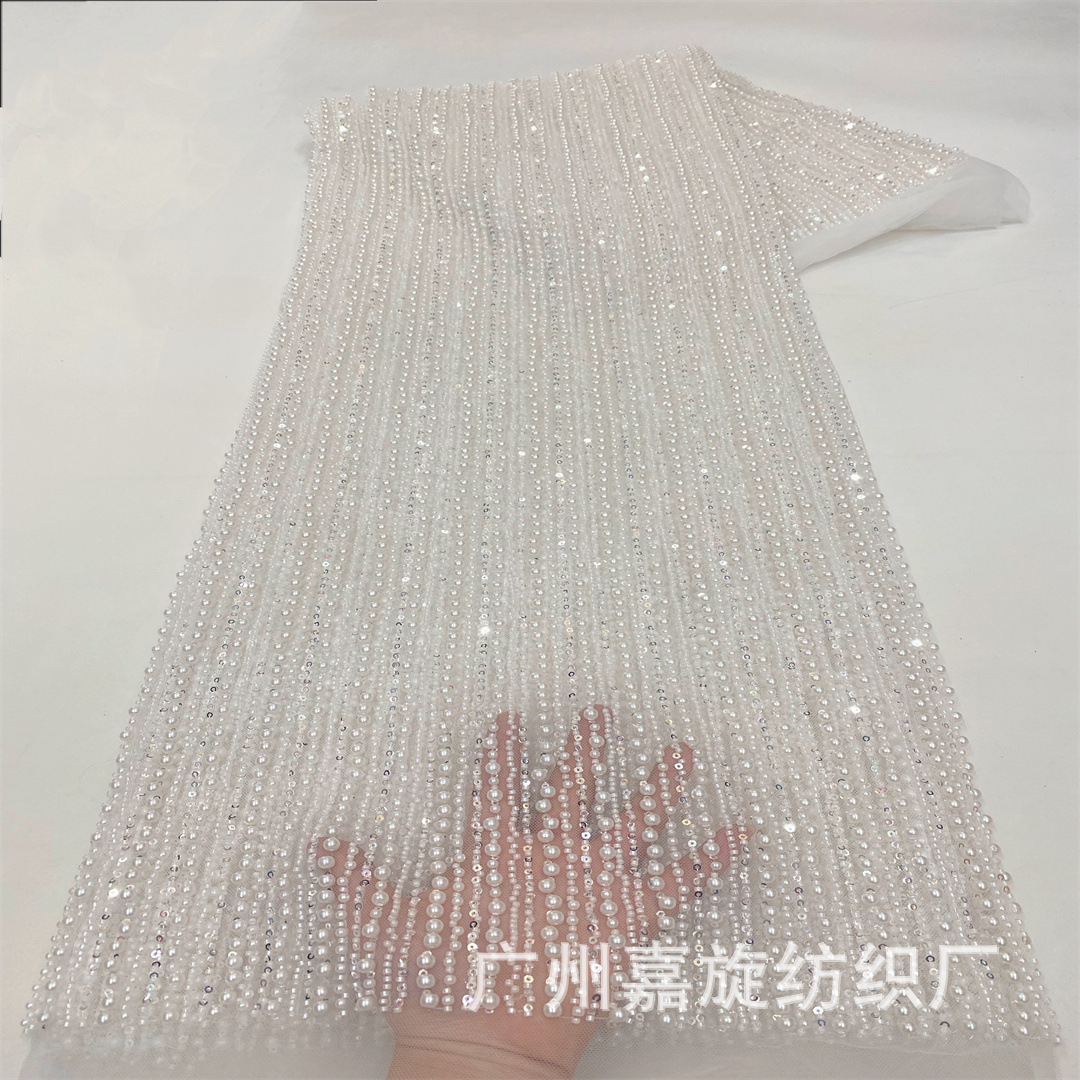 Tela de encaje de moda con bordado floral de cuentas y rayas verticales estilo francés, con abundantes cuentas, elegante para vestido de novia o de noche.