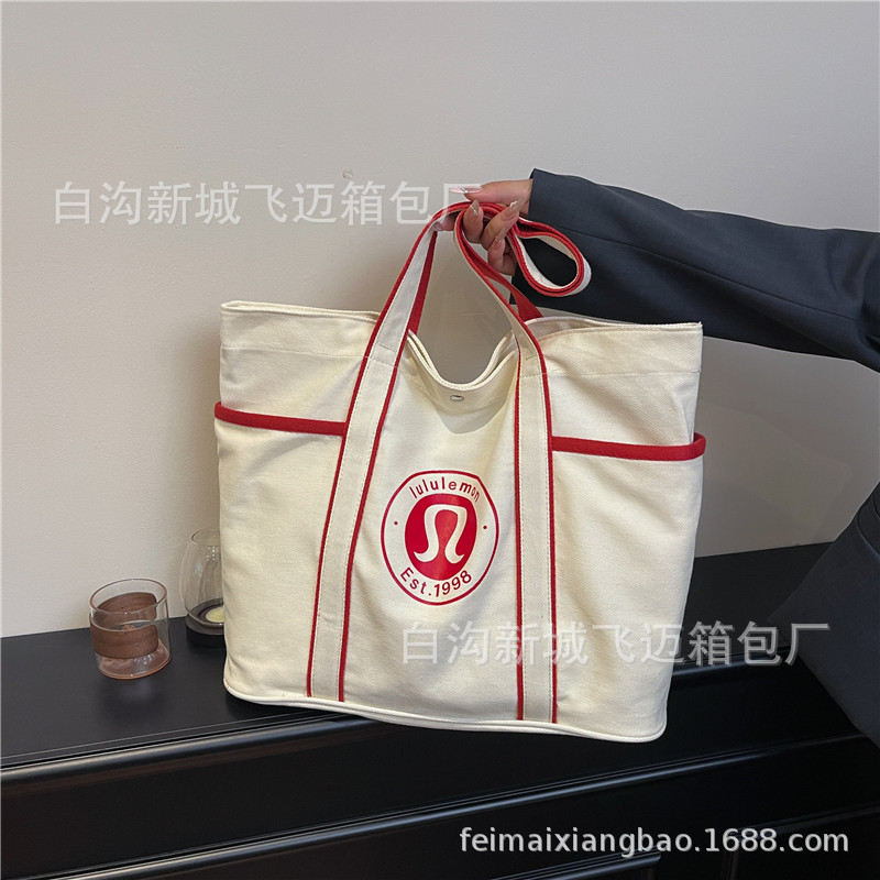 外贸女包2025春夏季新款简约休闲帆布包流行字母托特斜挎包bags潮|undefined