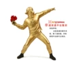 Banker throwing a flower boy-golden