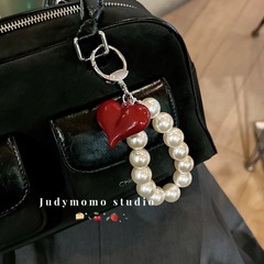 小香風真珠キャンディー蝶ネクタイキーホルダーハンドバッグ装飾ストラップバックパックペンダント卸売りプレゼント