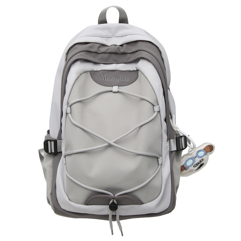 Estilo al aire libre, mochila a pie, mochila ligera de nicho, mochila gris de alta calidad para niñas de secundaria
