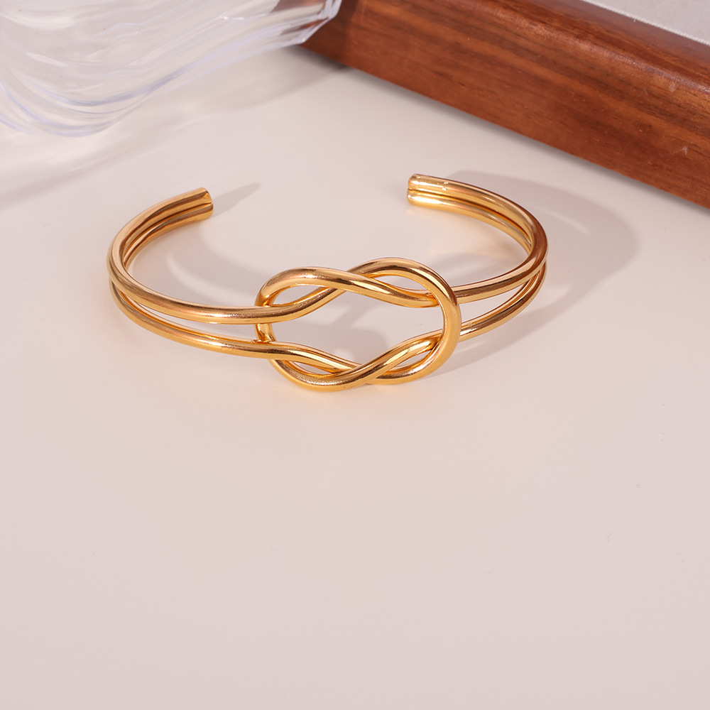 Brazalete de acero inoxidable transfronterizo de 18K personalidad exagerada simple anudado abierto pulsera de acero inoxidable INS todo fósforo venta caliente