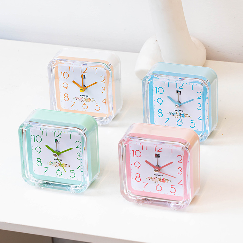 Ventas de fábrica simple reloj de alarma de plástico estudiante reloj de color caramelo con luz de dibujos animados claro fácil de llevar reloj de alarma