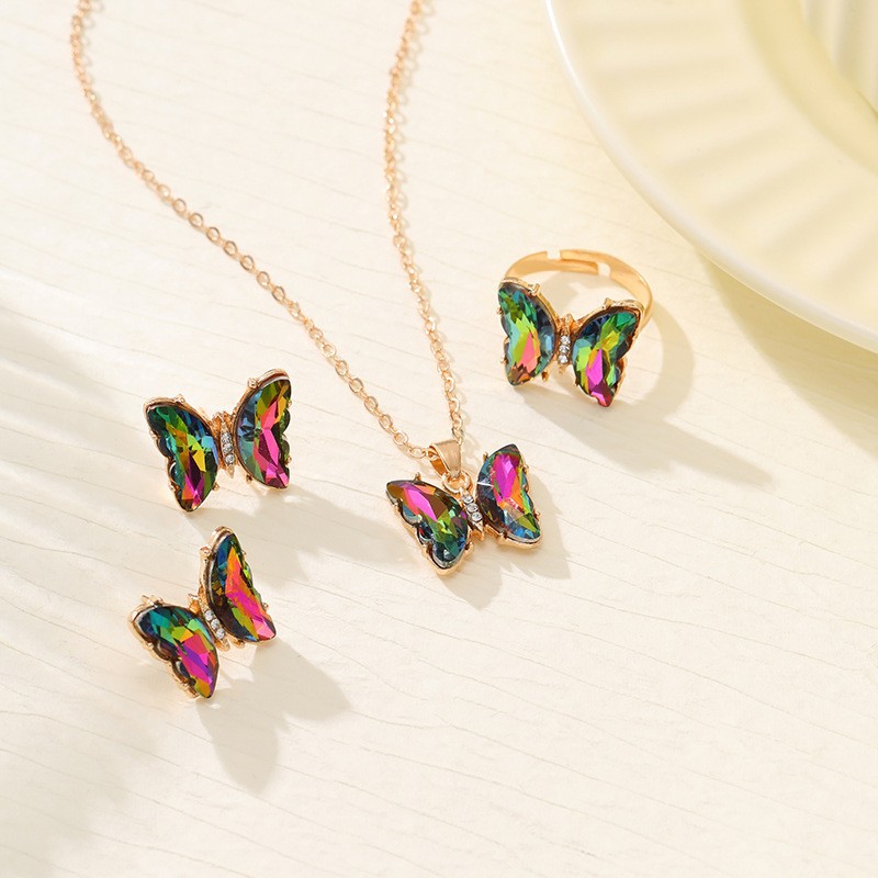 Ventas transfronterizas calientes coloridas 3 piezas de aretes collar anillo de moda europea y americana mariposa elegante collar de diamantes para mujeres