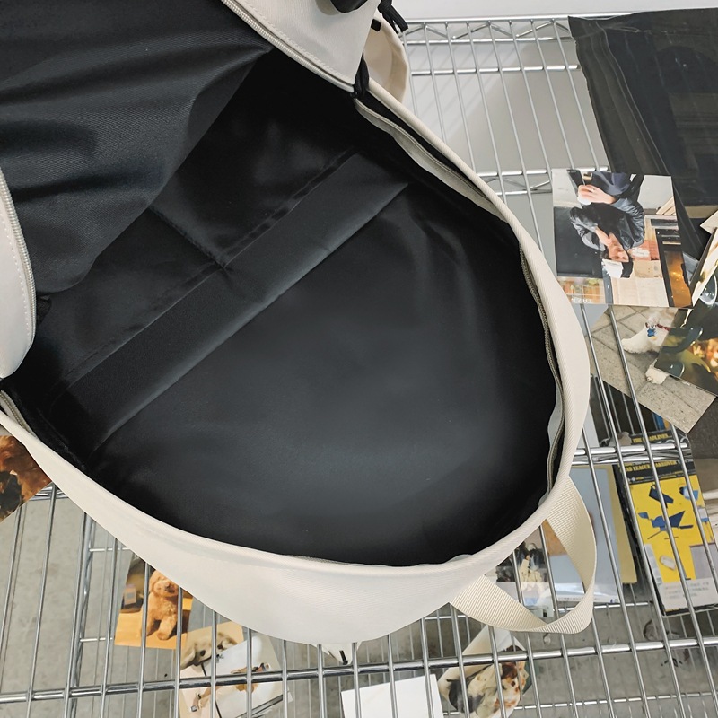 Mochila de nailon de gran capacidad de marca de moda 2024 mochila nueva simple universidad escuela secundaria escuela secundaria estudiante mochila escolar al por mayor