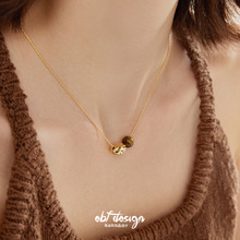 乌木坚果 法式极简浪漫几何虎眼石复古高级感美拉德项链