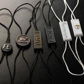 吊粒、吊牌;纸类标签;其他纺织皮革