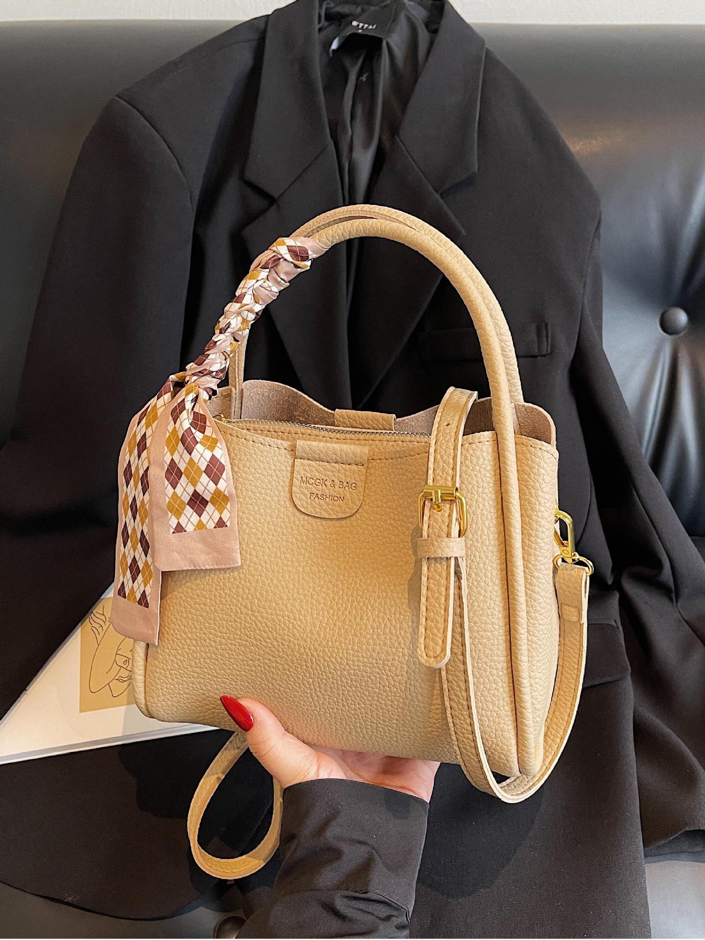 Bolso de mano explosivo transfronterizo para mujer 2025 nuevo bolso de mensajero de hombro de moda simple casual bolso de cubo de viaje