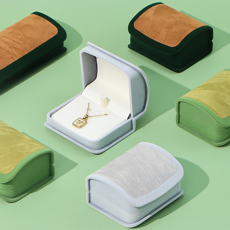 Nueva caja de joyería curva de alta gama, caja de almacenamiento, caja de anillo de franela, collar colgante, aretes, pulsera, caja de joyería