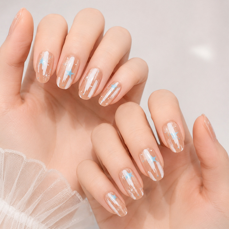 Trendy, handmade nail art featuring a champagne gold cat-eye star and snowflake design, perfect for a youthful look, and designed to enhance skin tone