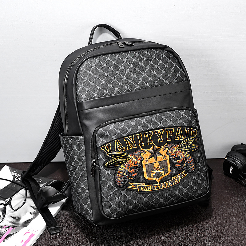 Sac à dos pour ordinateur portable pour homme avec broderie originale - Sac de travail antivol de grande capacité et résistant à l'eau, sac d'ordinateur durable de 15 pouces, style de voyage unisexe 2025_voghion.com