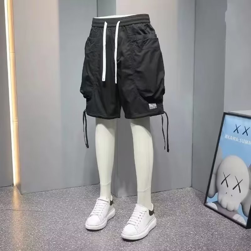 Moda 2024 nuevo estilo herramientas recto casual hombres sueltos de verano pantalones de moda sueltos control de imagen de fondo blanco