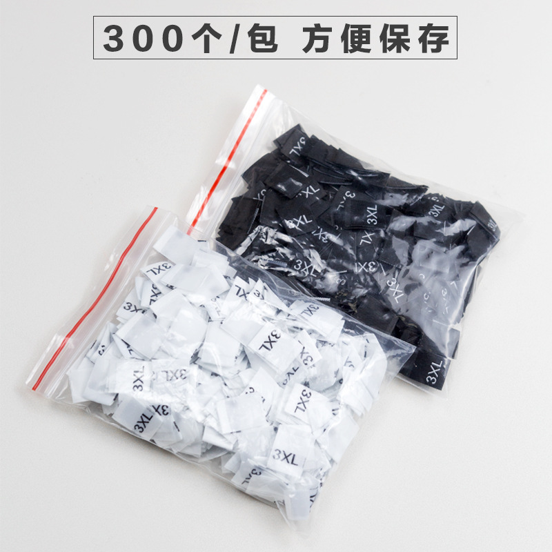 En stock Etiqueta de tamaño de alta densidad en blanco y negro Etiqueta de tamaño universal Etiqueta de código de letra inglesa Pantalones Etiqueta de código de cuello de camiseta