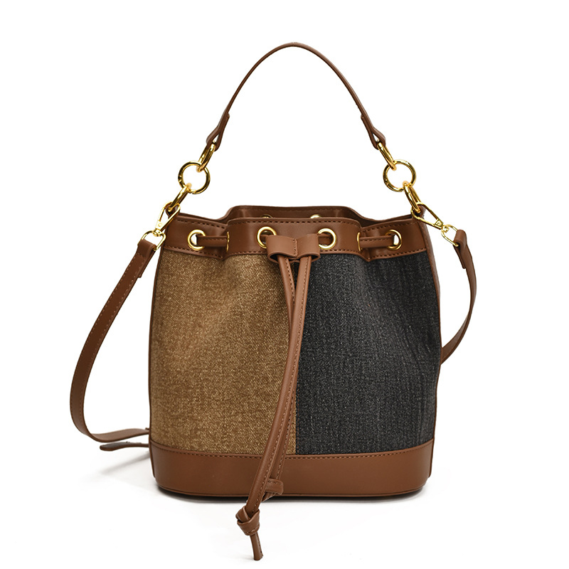 2025 otoño y invierno nuevo estilo coreano nicho bolso de cubo de agua mujer moda bolso de correa de color contraste de moda bolso de hombro