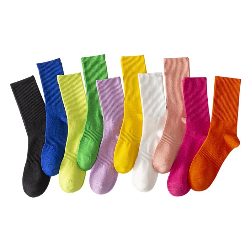 Calcetines de algodón de color liso a media pantorrilla para otoño e invierno, venta al por mayor, calcetines de algodón peinado para mujer, medias de algodón a rayas caramelo