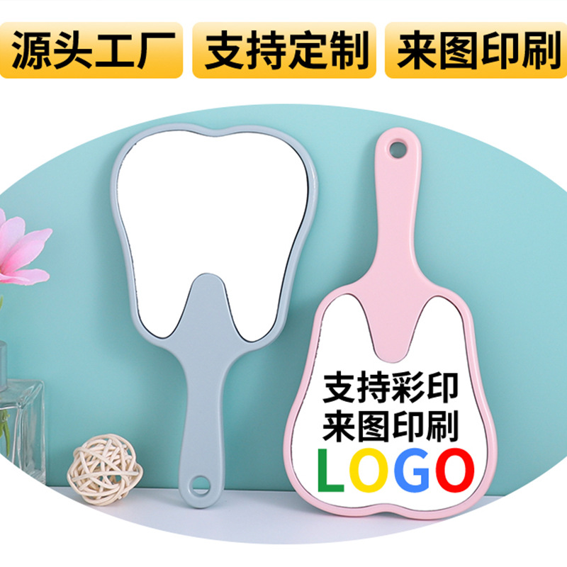 Espejo portátil en forma de diente pequeño clínico dental HD espejo de mano multicolor publicitario