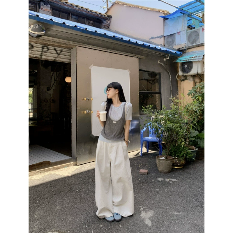 Реальный снимок, реальная цена, дизайн с контрастной цветовой маркировкой, поддельная тонкая футболка из двух частей с короткими рукавами + белые потертые повседневные широкие брюки