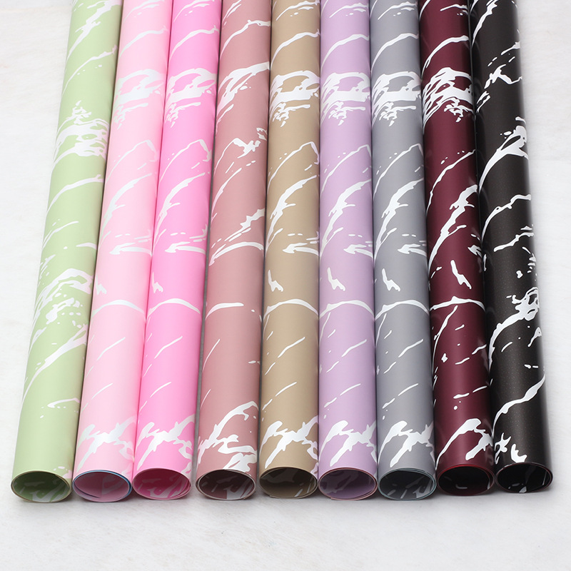 Huaxi Ouya Paper Mármol Papel de embalaje de flores Impresión engrosado Papel de flores impermeable Florería Ramo de flores Embalaje floral