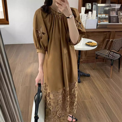 小衆の怠惰な風のカレー色のワンピースの女性の夏のお茶の休憩のフランスの気質の透かし彫りのレースのゆったりしているカジュアルな長いスカート
