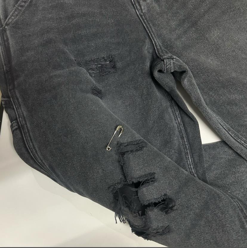 Jeans uomo loose gamba dritta lavaggio denim con strappi_voghion.com