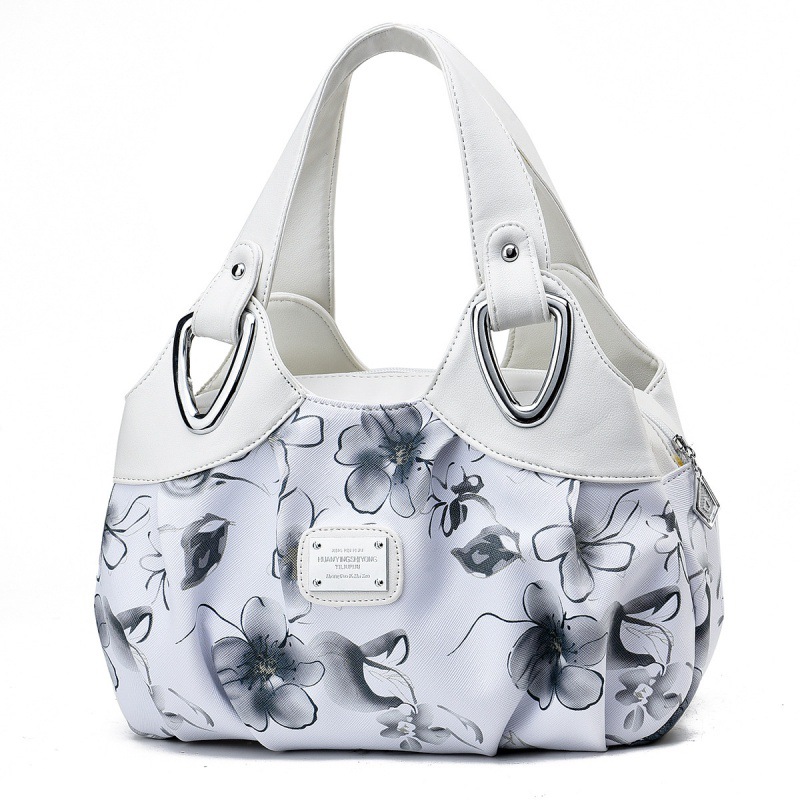 Fábrica al por mayor de color de contraste nueva moda europea y americana de gran capacidad de moda estilo occidental impreso simple bolso de mujer de una sola pieza de entrega