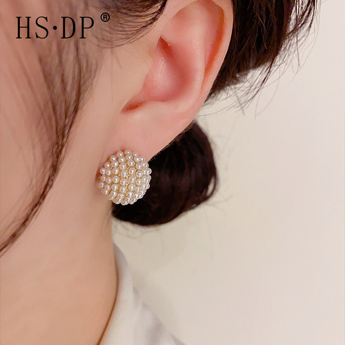 The same stylish and elegant pearl hoop earrings with a unique design, fashionable, cute, and a high-end vibe.
