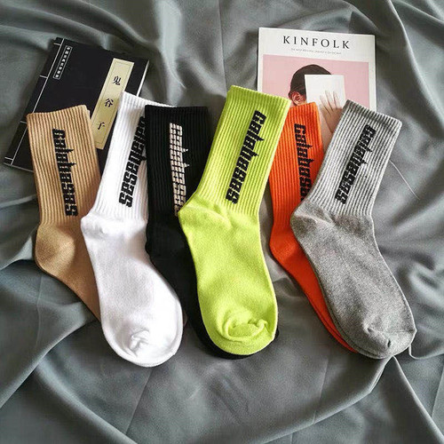 Socks men's autumn and winter ins trendy socks European and American couples mid-calf socks coconut white letter basketball socks Kanye's same style
