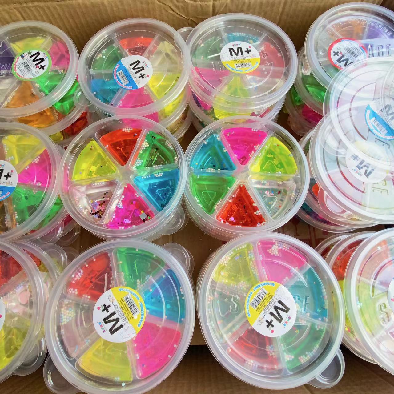 Fábrica al por mayor de seis colores de barro de cristal plastilina arcilla redonda espuma anillo de goma 2 yuanes juguete tienda por mayor 6 rejilla